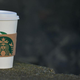 starbucks cup on ledge